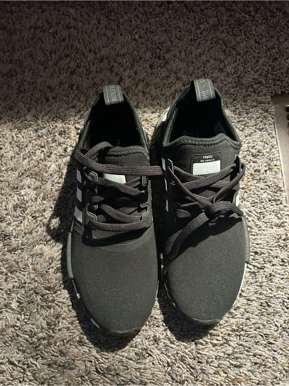 Grade School Boys
Black Athletic Sneakers with White Stripes